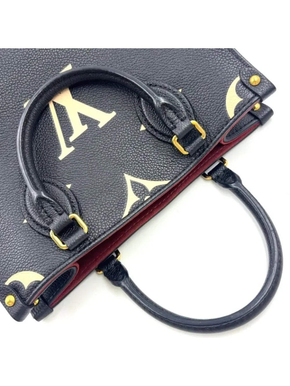 Louis Vuitton On The Go PM Bicolor Monogram Empreinte Leather Black Handbag Gold